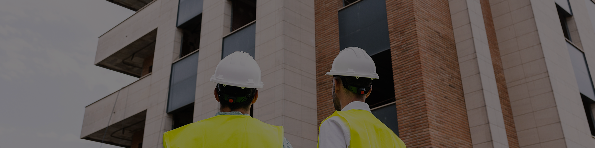 Office Building With Hard Hat Workers